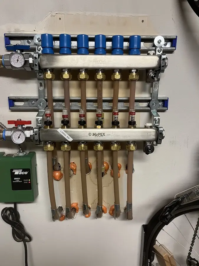 Plumber performing Water Heater Repair at a residential property in Mahtomedi